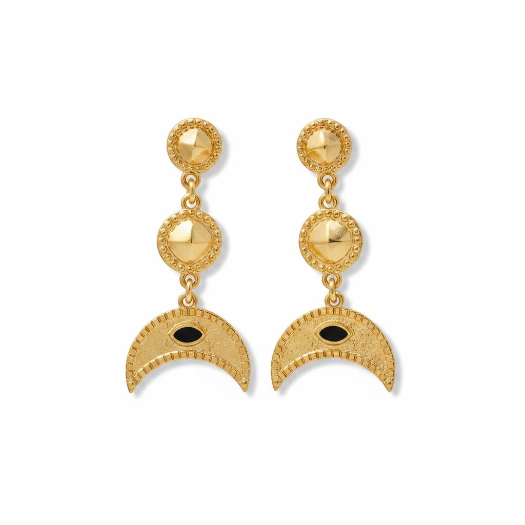elephantina.gr 24k gold-plated brass drop earrings featuring a crescent moon motif with a black enamel evil eye.