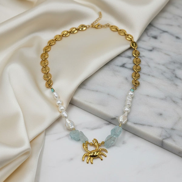 Elephantina.gr gold crab necklace with freshwater pearls, aquamarine stones, and unique chain. 55cm + 5cm extension.