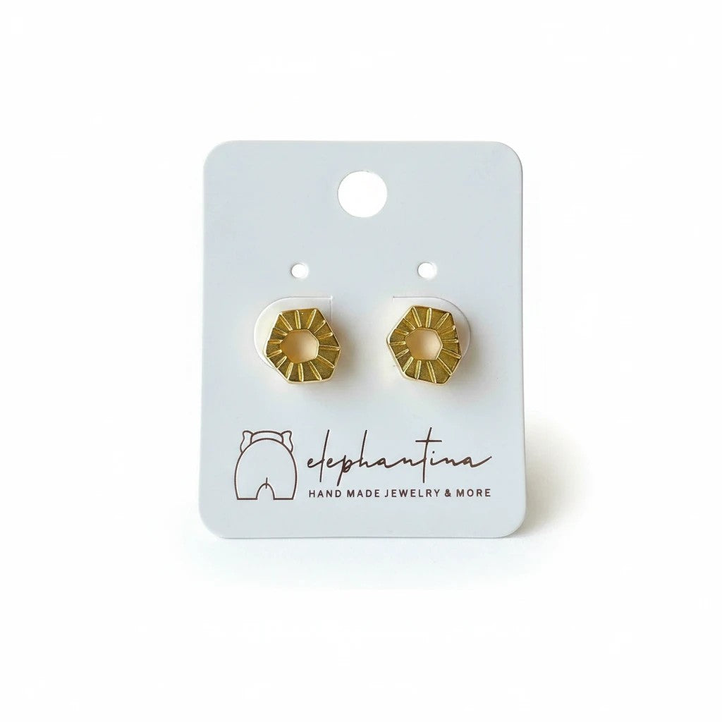elephantina.gr 24K gold-plated brass minimalist hexagon stud earrings with titanium posts on display card.