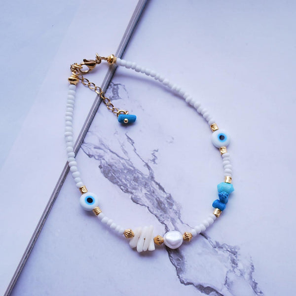 Βραχιόλι ποδιού με ματάκια, μαργαριτάρια και λευκές χάντρες