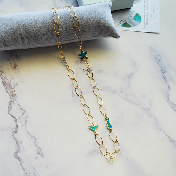 Κολιέ με ατσάλινη αλυσίδα και στοιχεία ''sea mix'' βιτρό μπλε